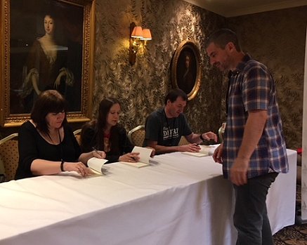 Signing books: L to R: Marie O'Regan, Charlotte Bond, Richard Farren Barber