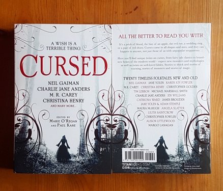 Front and back covers of Cursed, edited by Marie O'Regan and Paul Kane