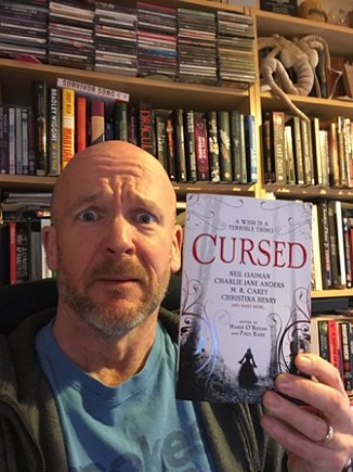 Tim Lebbon with contributor's copy of Cursed, edited by Marie O'Regan and Paul Kane