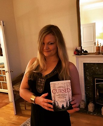 Catriona Ward with contributor's copy of Cursed, edited by Marie O'Regan and Paul Kane