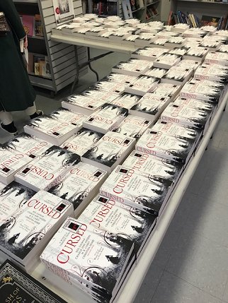 Copies of Cursed, edited by Marie O'Regan and Paul Kane, ready for signing