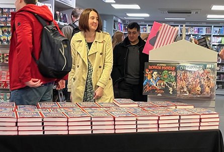 photograph of people queuing to get their copies of Death Comes at Christmas, edited by Marie O'Regan and Paul Kane