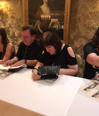 Marie O'Regan signing copies of Great British Horror #2, Dark Satanic Mills