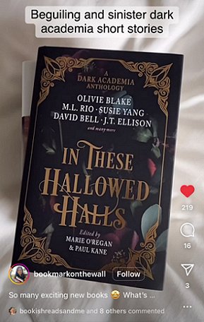 image showing a copy of In THese Hallowed Halls, edited by Marie O'Regan and Paul Kane, lying on top of another book on a white cloth. Text reads Beguiling and sinister dark academia short stories