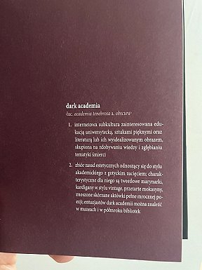 photograph showing an inner page detailing the definition of Dark Academia, from the Polish edition of In These Hallowed Halls, edited by Marie O'Regan and Paul Kane