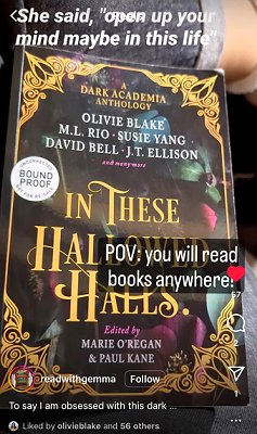 Screenshot showing a copy of In These Hallowed Halls, edited by Marie O'Regan and Paul Kane. Text on image reads POV: you will read books anywhere, 'She said, 'open up your mind maybe in this life'