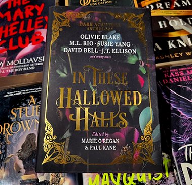 book display, featuring a copy of In These Hallowed Halls, edited by Marie O'Regan and Paul Kane