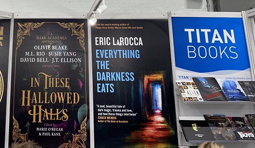 Banner display for Titan Books at London Book Fair, featuring In These Hallowed Halls, edited by Marie O'Regan and Paul Kane