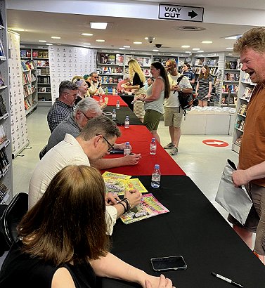 Signing line for The Other Side of Never - from front: Marie O'Regan, Cavan Scott, Paul Finch, Guy Adams, ALexandra Benedict, Laura Mauro