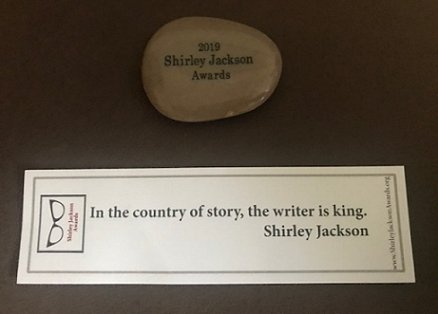 2019 Shirley Jackson awards nominee token and quotation on bookmark - In the country of story, the writer is king.Shirley Jackson.
