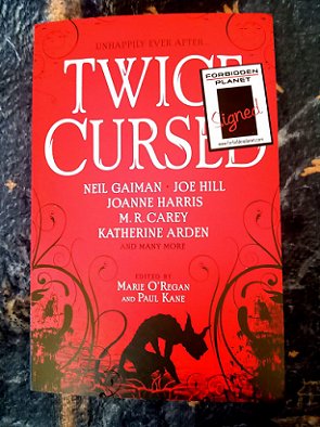 Copy of Twice Cursed, edited by Marie O'Regan and Paul Kane, featuring a signed copy sticker from Forbidden Planet