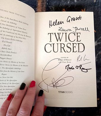 Interior title page of Twice Cursed, edited by Marie O'Regan and Paul Kane, signed by the editors, Laura Purcell, Helen Grant, and Joanne Harris