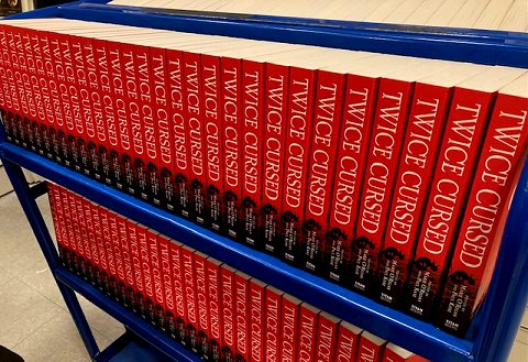 Trolley loaded with copies of Twice Cursed, edited by Marie O'Regan and Paul Kane
