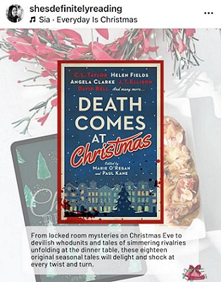 screenshot from @shesdefinitelyreading. Image shows a copy of Death Comes at Christmas, edited by Marie O'Regan and Paul Kane, superimposed over a faded image of a tablet with an image of Christmas trees on a black background, a red and green wreath and a decorative bread wreath decorated wit almonds. Text reads: From locked room mysteries on Christmas Eve to devilish whodunits and tales of simmering rivalries unfolding at the dinner table, these eighteen original seasonal tales will delight and shock at every twist and turn