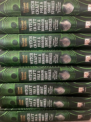 photograph showing a stack of copies of Beyond & Within: Witchcraft, edited by Marie O'Regan and Paul Kane, showing the books' spines